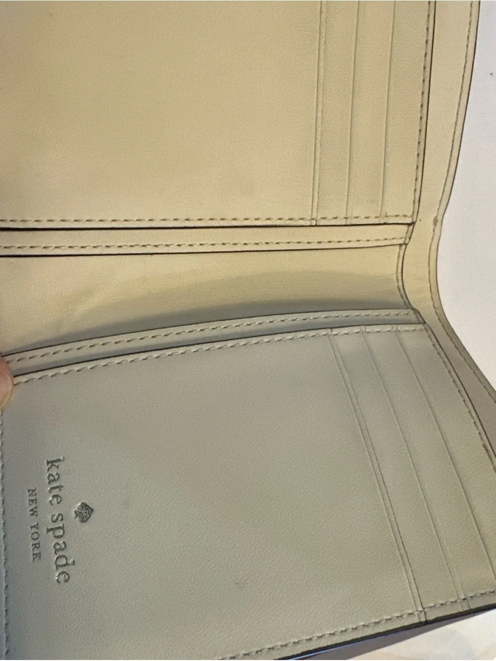 Kate Spade New York Reegan Pansy cream wallet with purple and yellow floral